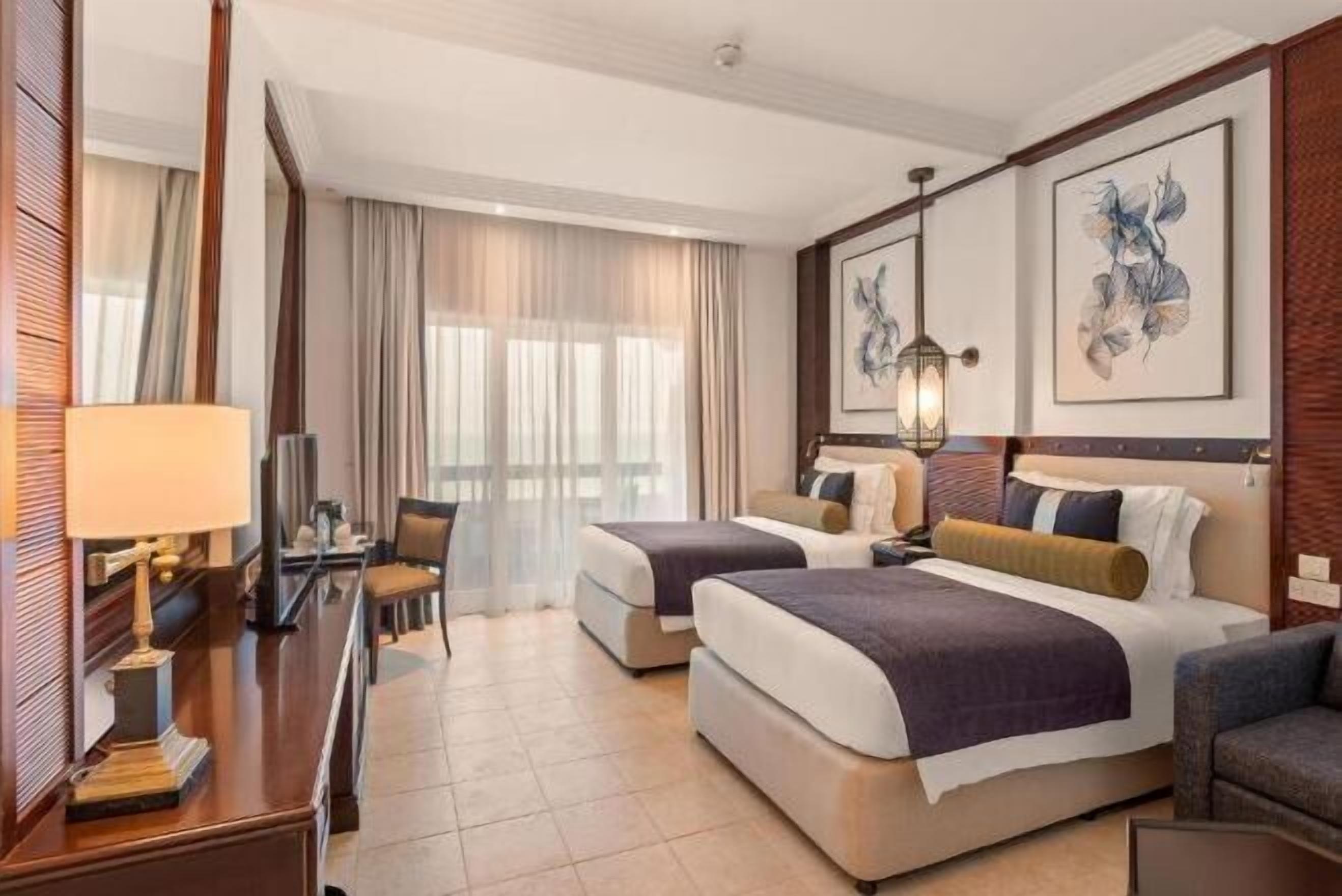 Premium bedding, down comforters, minibar, in-room safe