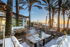 Lunch, dinner served; local and international cuisine, pool views 