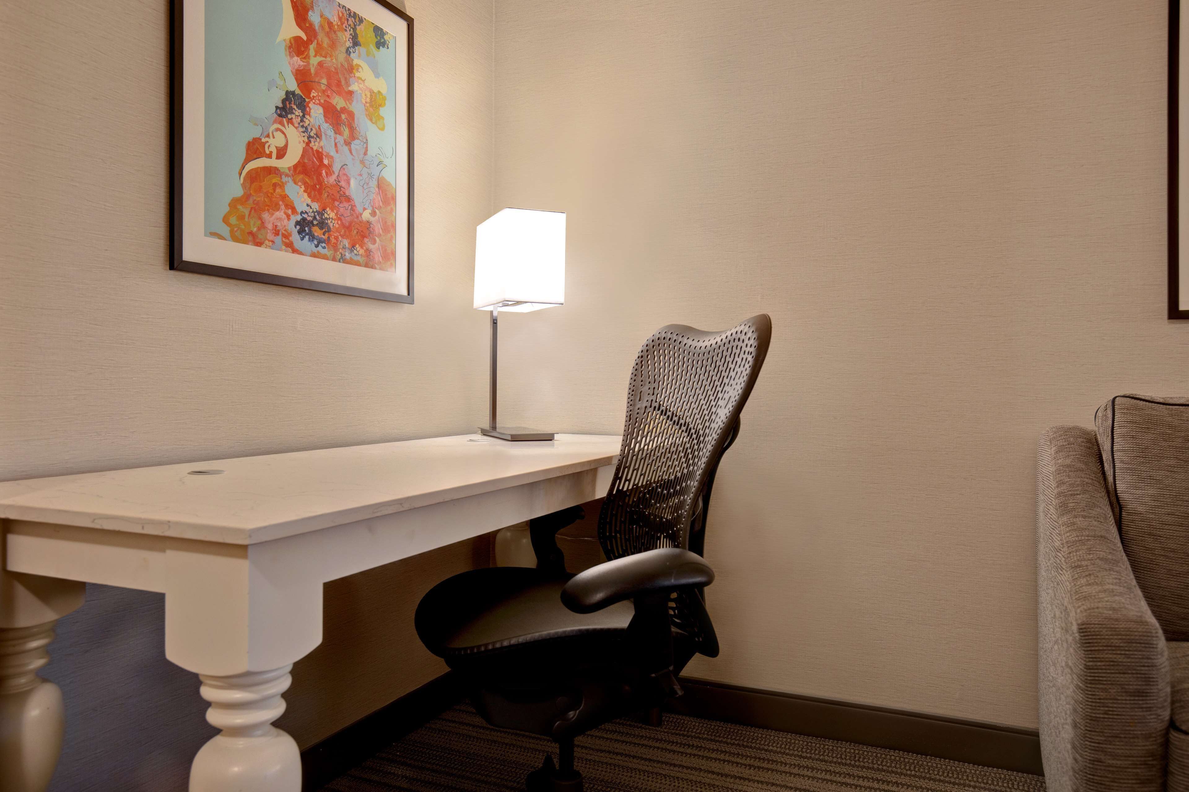 premium bedding, desk, laptop workspace, iron/ironing board