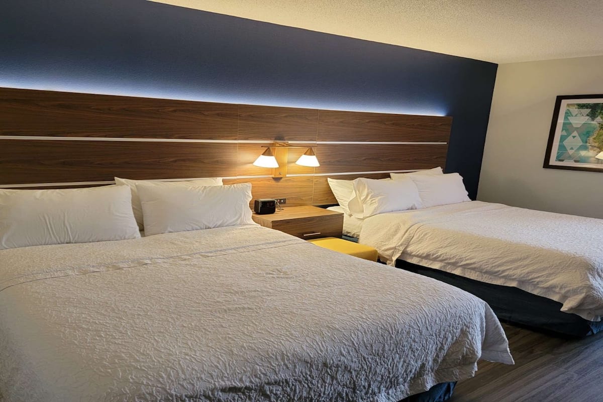 Pillow-top beds, desk, laptop workspace, blackout curtains