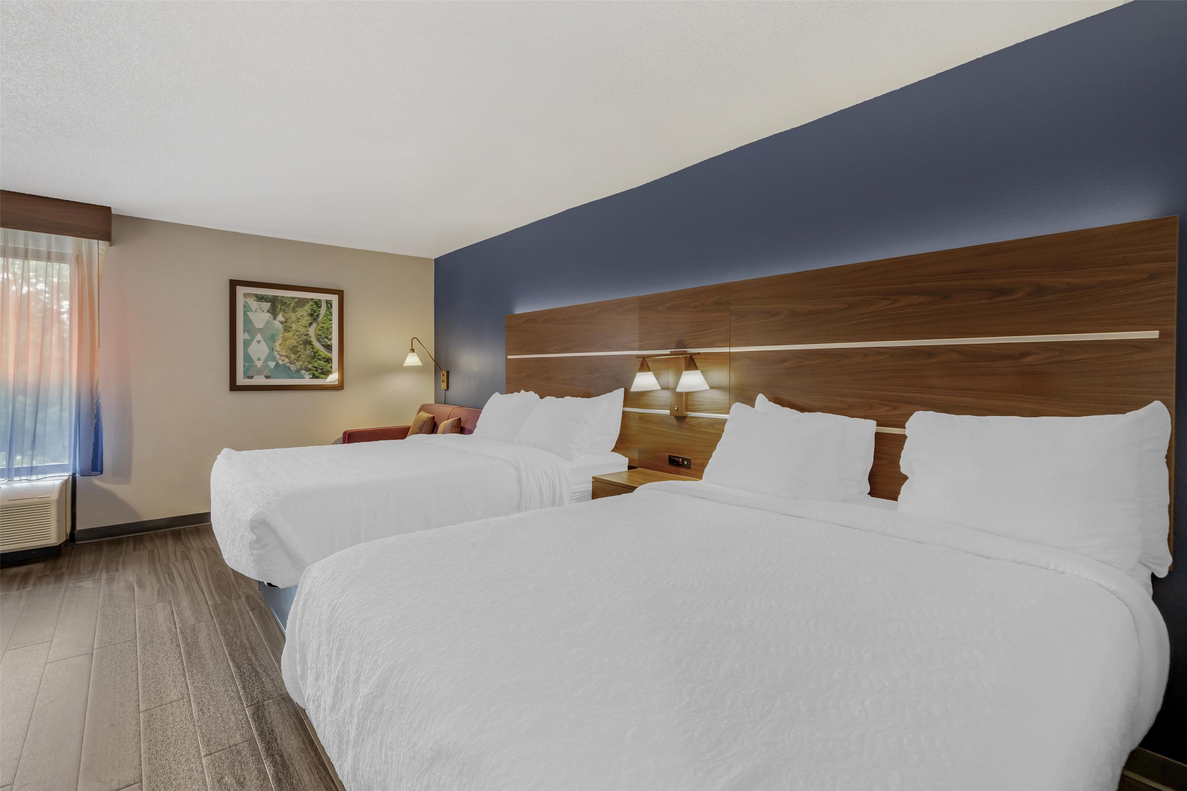 standard room, 2 queen beds, non smoking, refrigerator & microwave (with single sofabed) | 1 bedroom, pillow-top beds, desk, laptop workspace