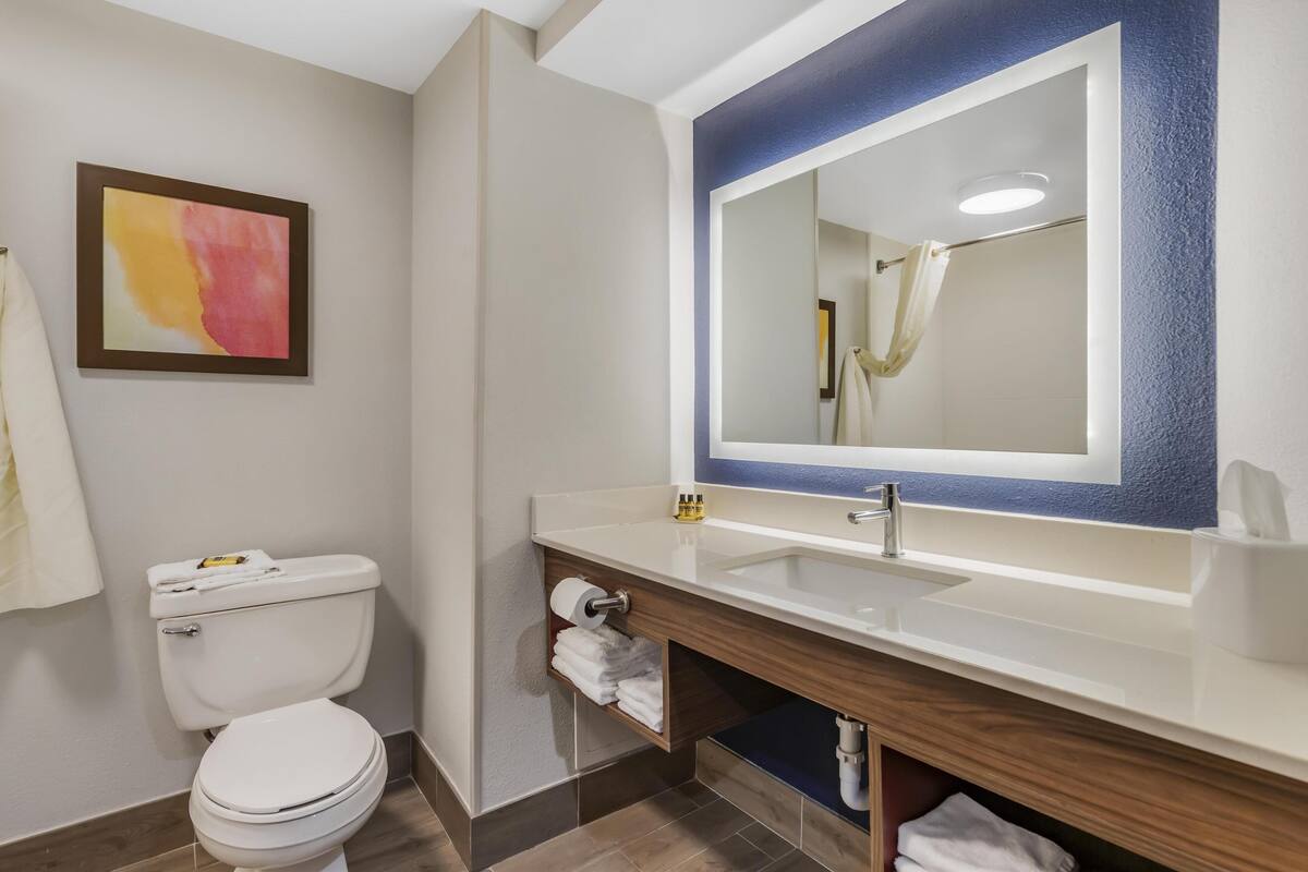 standard room, 2 queen beds, non smoking, refrigerator & microwave (with single sofabed) | bathroom | combined shower/bathtub, free toiletries, hair dryer, towels