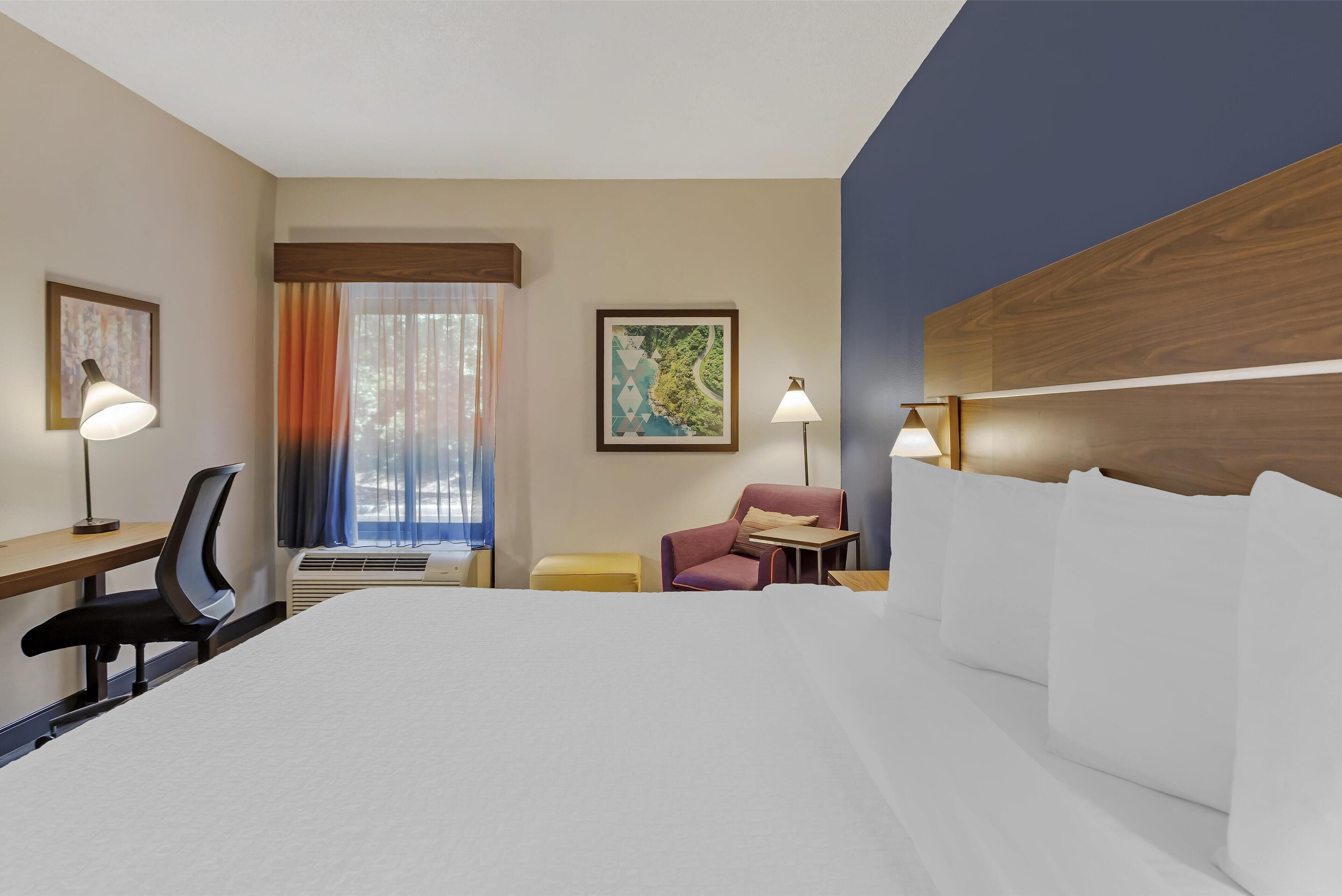 Pillowtop beds, desk, laptop workspace, blackout drapes