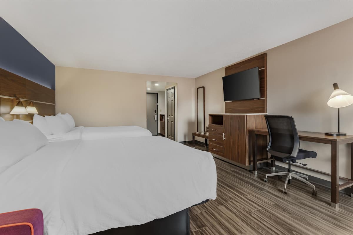 Standard Room, 2 Queen Beds, Non Smoking, Refrigerator & Microwave (with Single Sofabed) | Pillow-top beds, desk, laptop workspace, blackout curtains