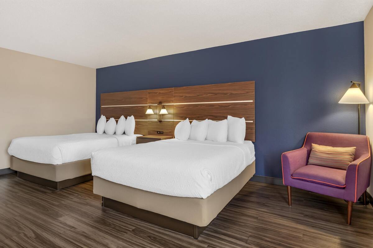 standard room, 2 queen beds, non smoking, refrigerator & microwave | 1 bedroom, pillow-top beds, desk, laptop workspace