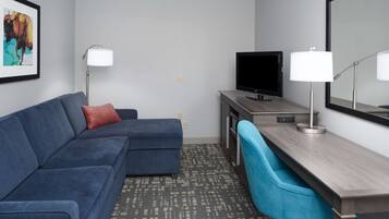 Suíte, 1 cama King, para não fumantes | Área de estar | TV LCD 27 polegadas com canais a cabo, TV