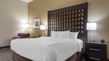 Desk, laptop workspace, blackout drapes, iron/ironing board