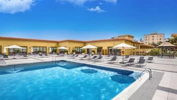 Indoor pool, outdoor pool, pool umbrellas, pool loungers