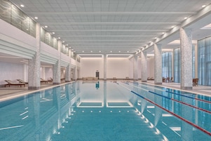 Indoor pool, outdoor pool, pool umbrellas, sun loungers