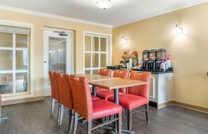 Enjoy meals in this dining area with a long table and comfortable seating for six, plus a convenient coffee station.