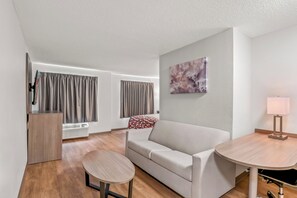 Suite, 1 King Bed, Non Smoking | 1 bedroom, desk, laptop workspace, blackout drapes