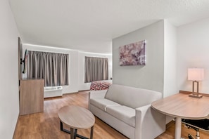 Suite, 1 King Bed, Non Smoking | Desk, laptop workspace, blackout curtains, free WiFi