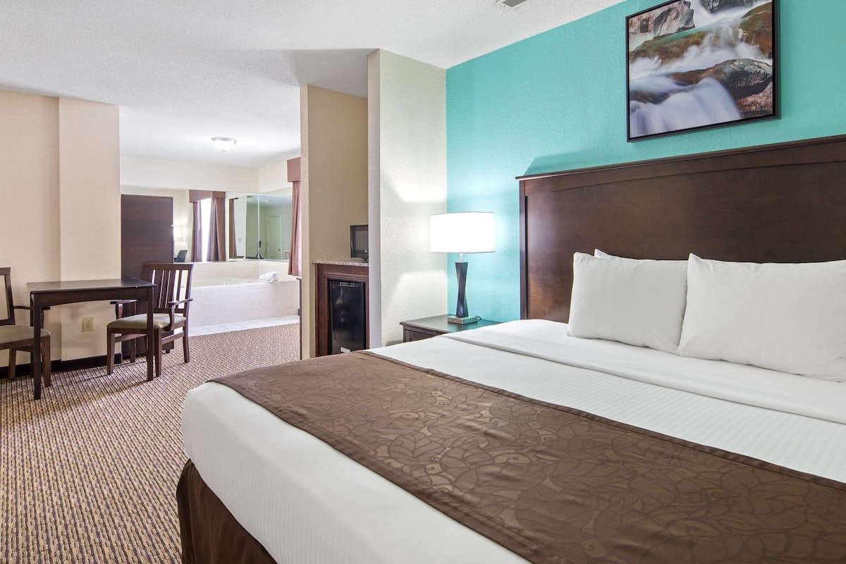 suite, 1 king bed, non smoking, jetted tub (oversized room;with sofabed) | pillow-top beds, desk, laptop workspace, blackout curtains