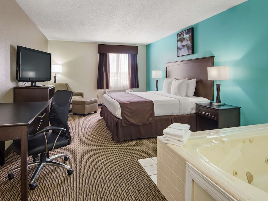 Suite, 1 King Bed, Non Smoking, Jetted Tub | Pillowtop beds, desk, laptop workspace, blackout drapes
