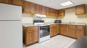 Suite, 1 King Bed, Non Smoking, Kitchen (with Sofabed, Full Kitchen) | Pillow-top beds, desk, laptop workspace, blackout curtains
