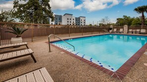 Outdoor pool, open 10:00 AM to 9:00 PM, sun loungers