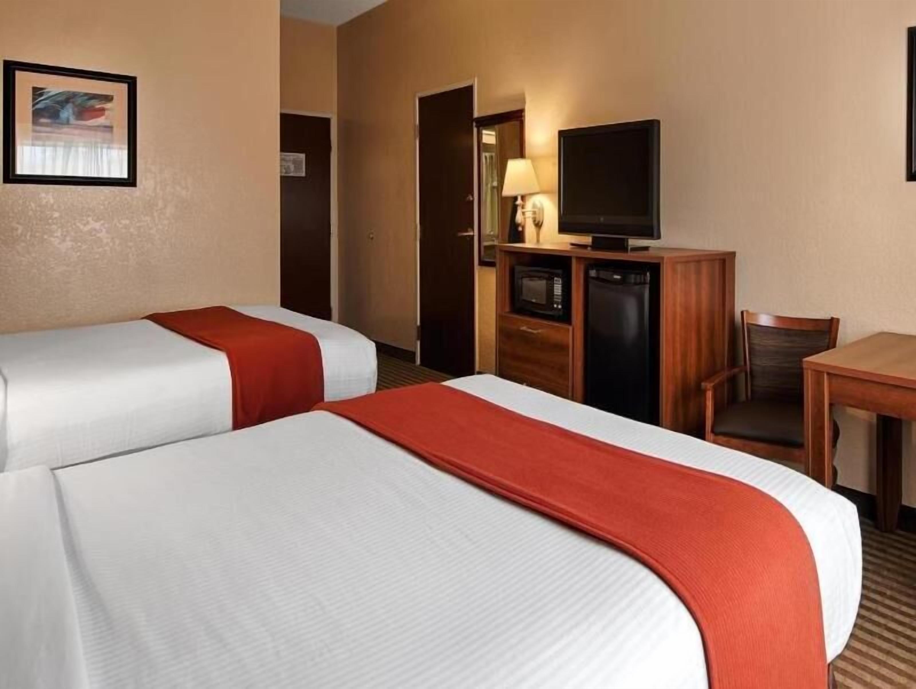 Desk, blackout curtains, soundproofing, iron/ironing board