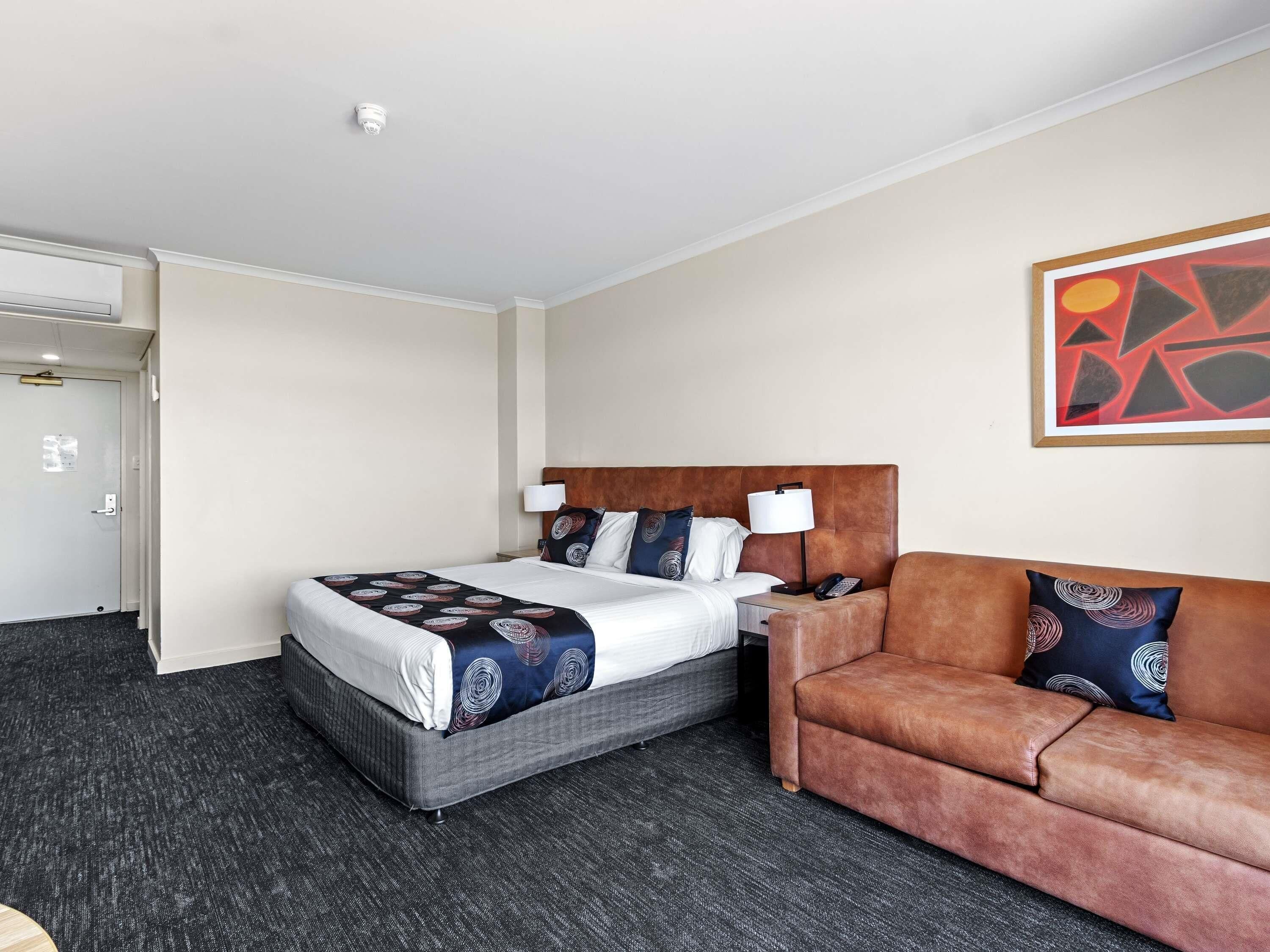 Superior Room, 1 King Bed | Blackout drapes, iron/ironing board, free WiFi, bed sheets