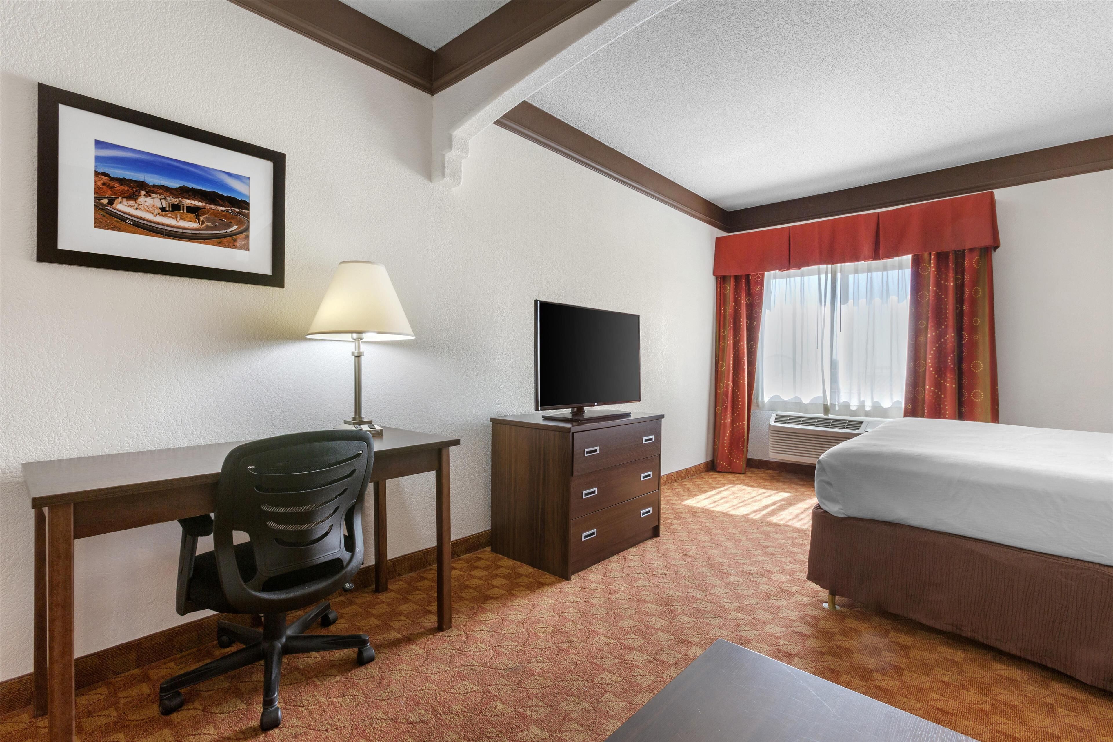 standard room, 1 king bed, non smoking, refrigerator & microwave | 1 bedroom, desk, laptop workspace, iron/ironing board