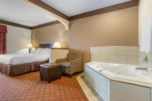 Executive Room, 1 King Bed, Non Smoking, Jetted Tub | 1 bedroom, desk, laptop workspace, iron/ironing board