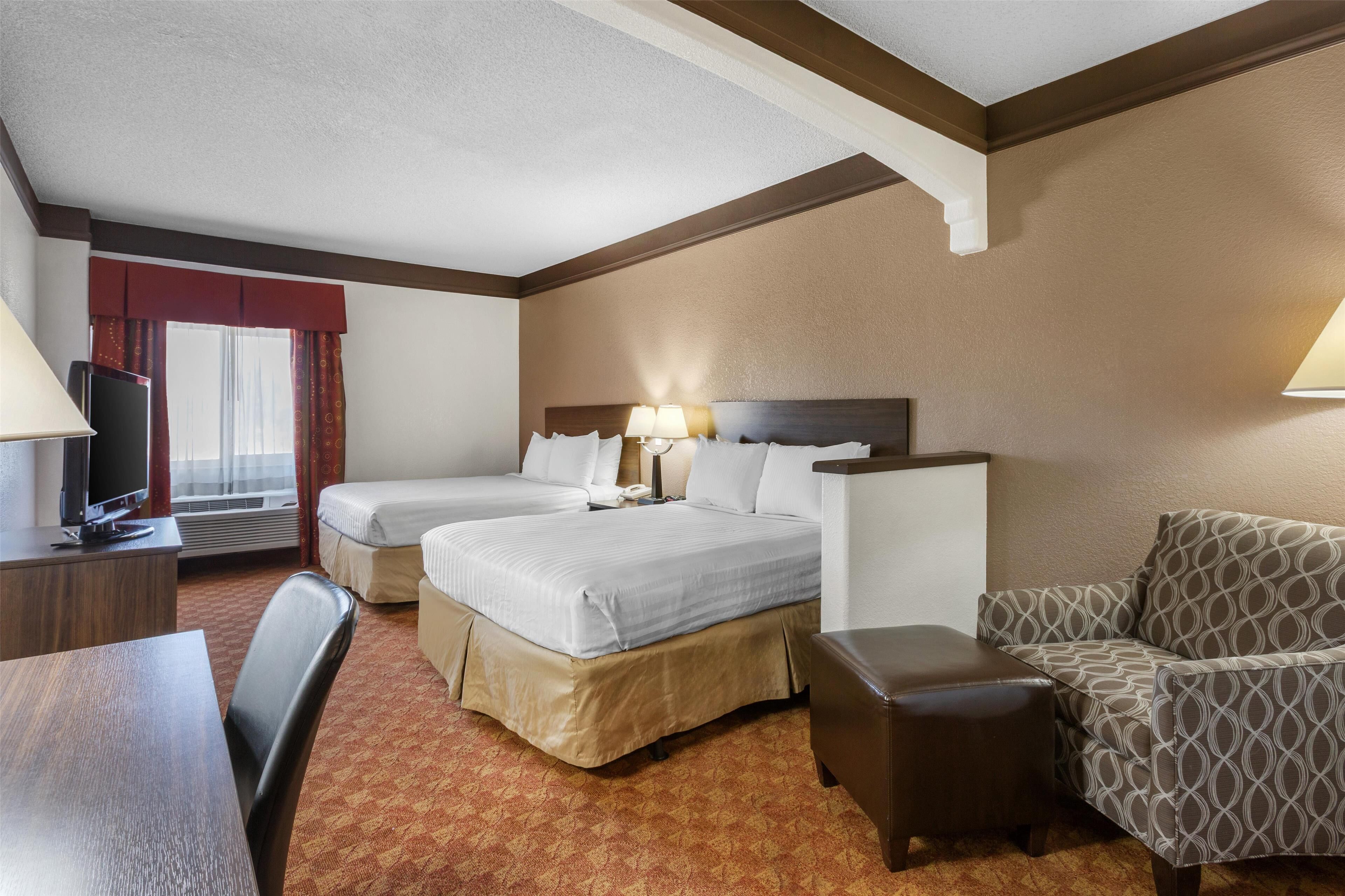 standard room, 2 queen beds, non smoking, refrigerator & microwave | 1 bedroom, desk, laptop workspace, iron/ironing board