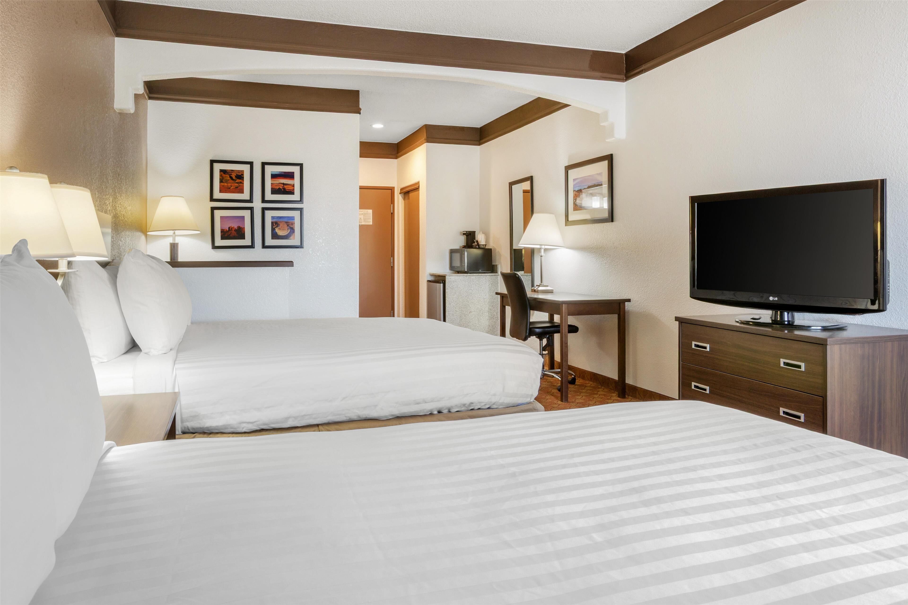 standard room, 2 queen beds, non smoking, refrigerator & microwave | 1 bedroom, desk, laptop workspace, iron/ironing board