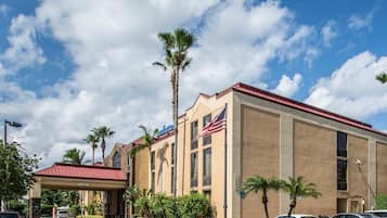 Hotel features a patriotic facade, symmetrical design, and a welcoming entrance area.