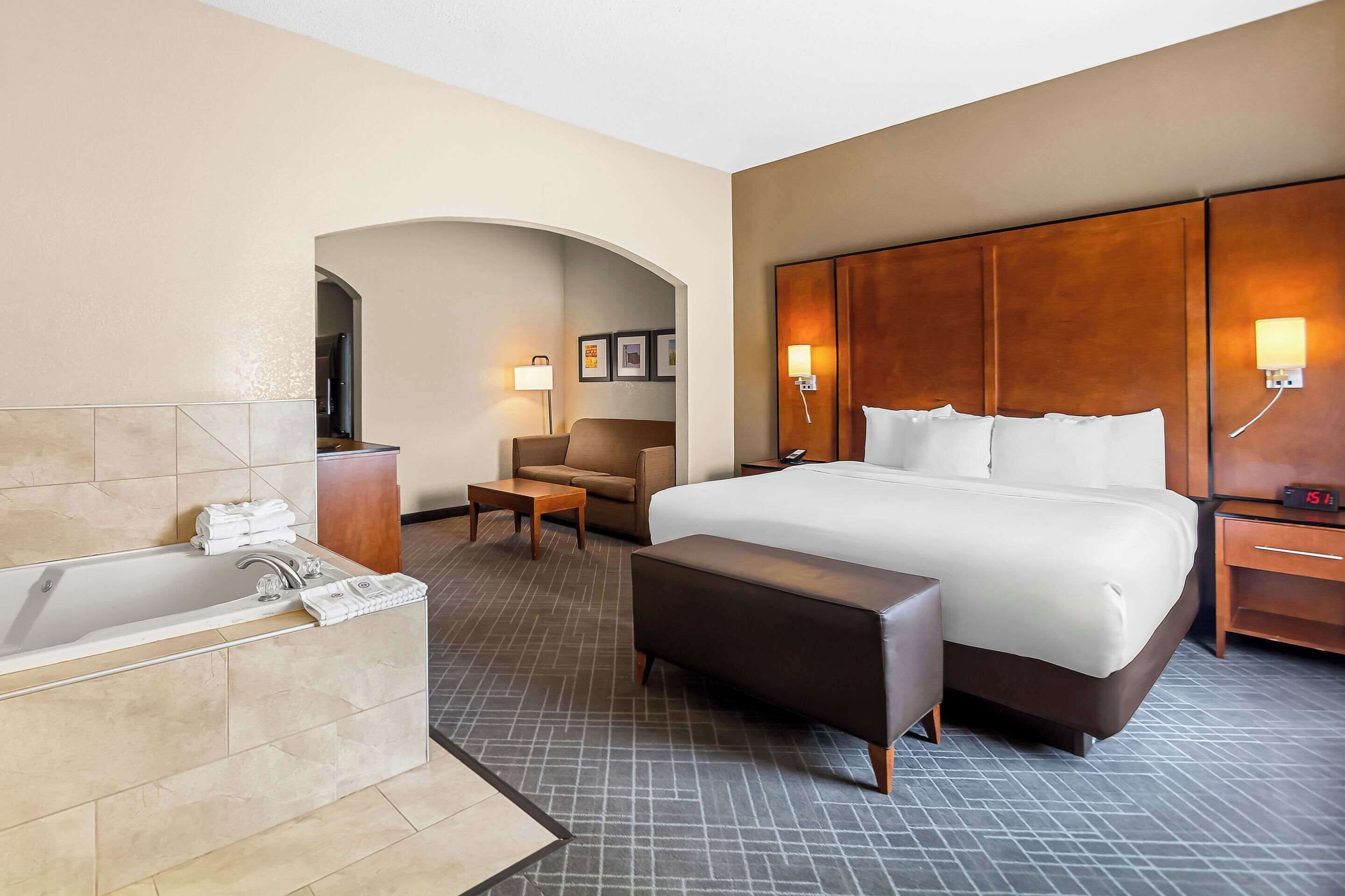 premium bedding, desk, blackout curtains, iron/ironing board