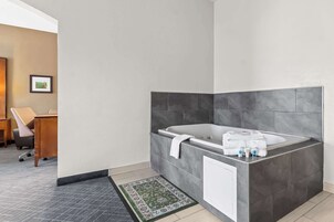 Premium bedding, desk, blackout drapes, iron/ironing board