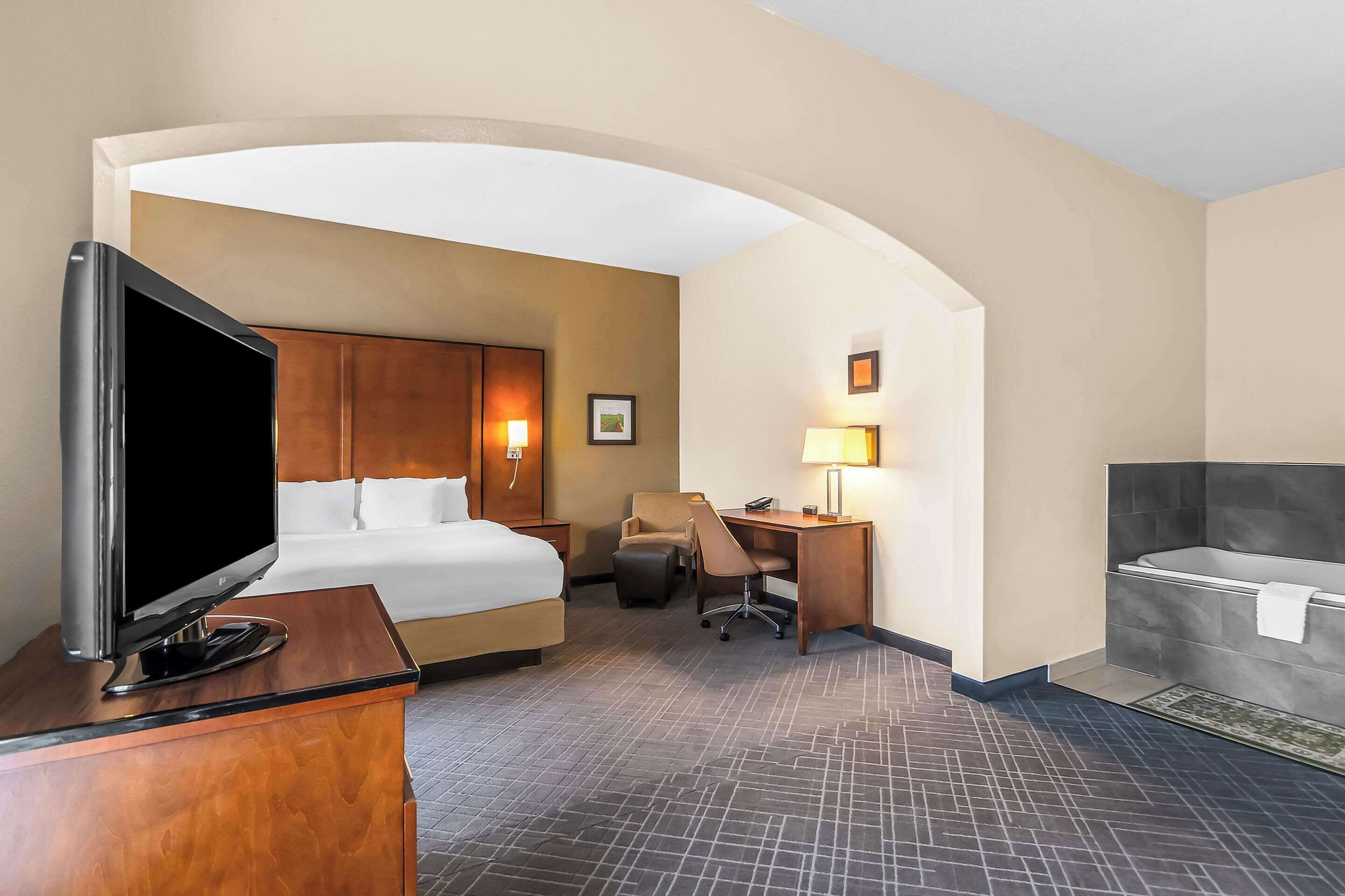 premium bedding, desk, blackout curtains, iron/ironing board