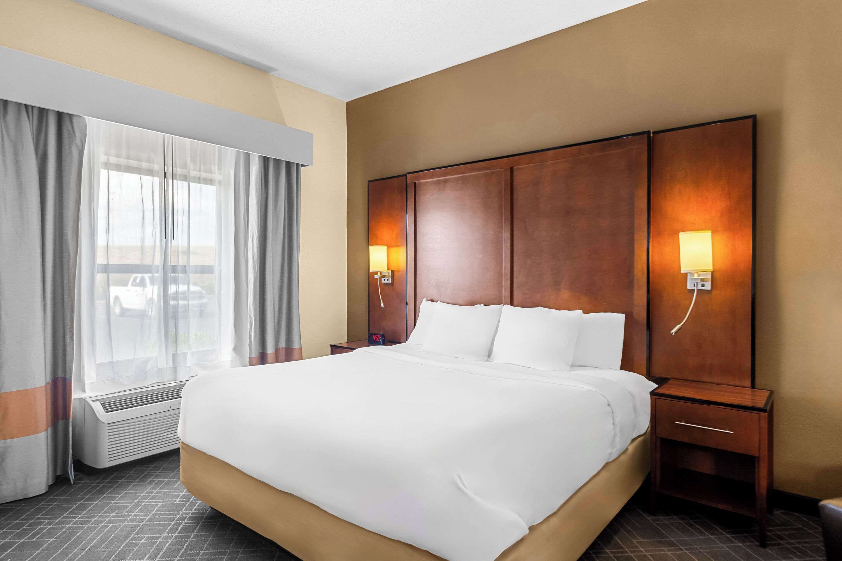 premium bedding, desk, blackout curtains, iron/ironing board