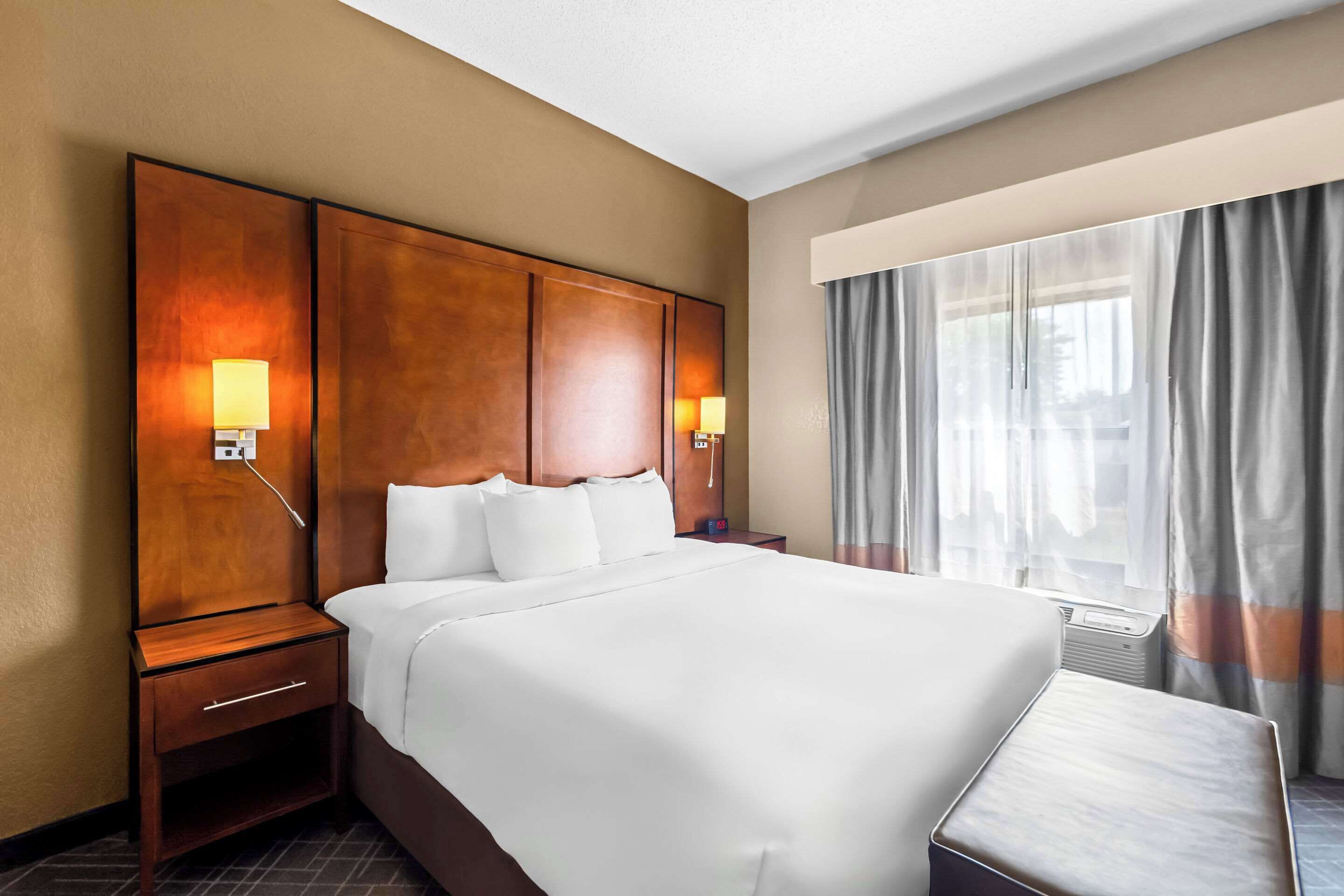 premium bedding, desk, blackout curtains, iron/ironing board