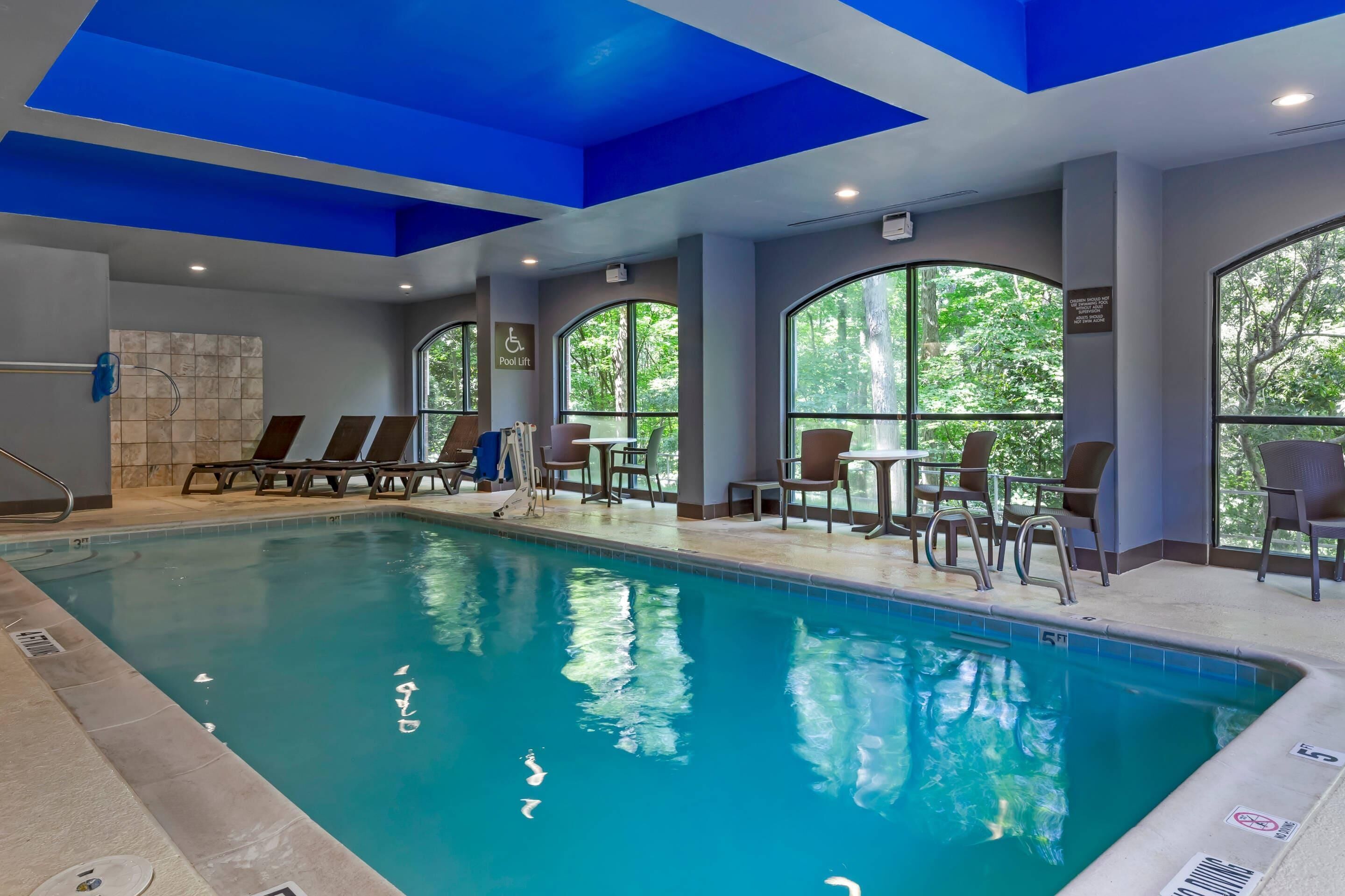 Indoor pool, open 10:00 AM to 10 PM, pool loungers