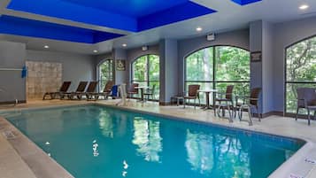 Indoor pool, open 10:00 AM to 10 PM, pool loungers