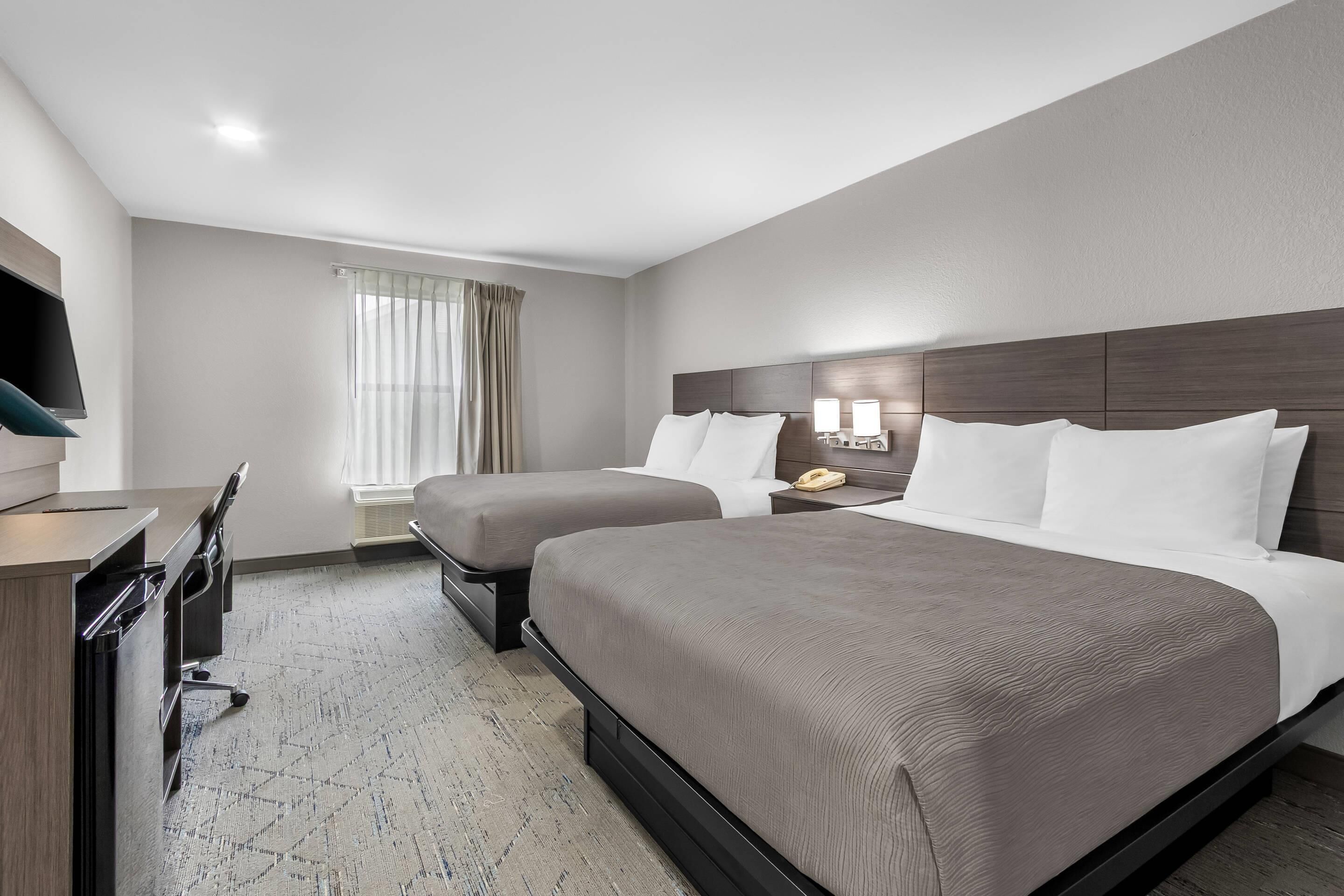 Room, 2 Queen Beds, Non Smoking | Desk, laptop workspace, iron/ironing board, free WiFi