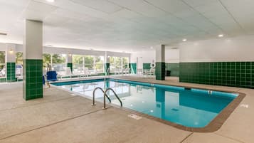 Indoor pool, open 7:00 AM to 11:00 PM, pool loungers