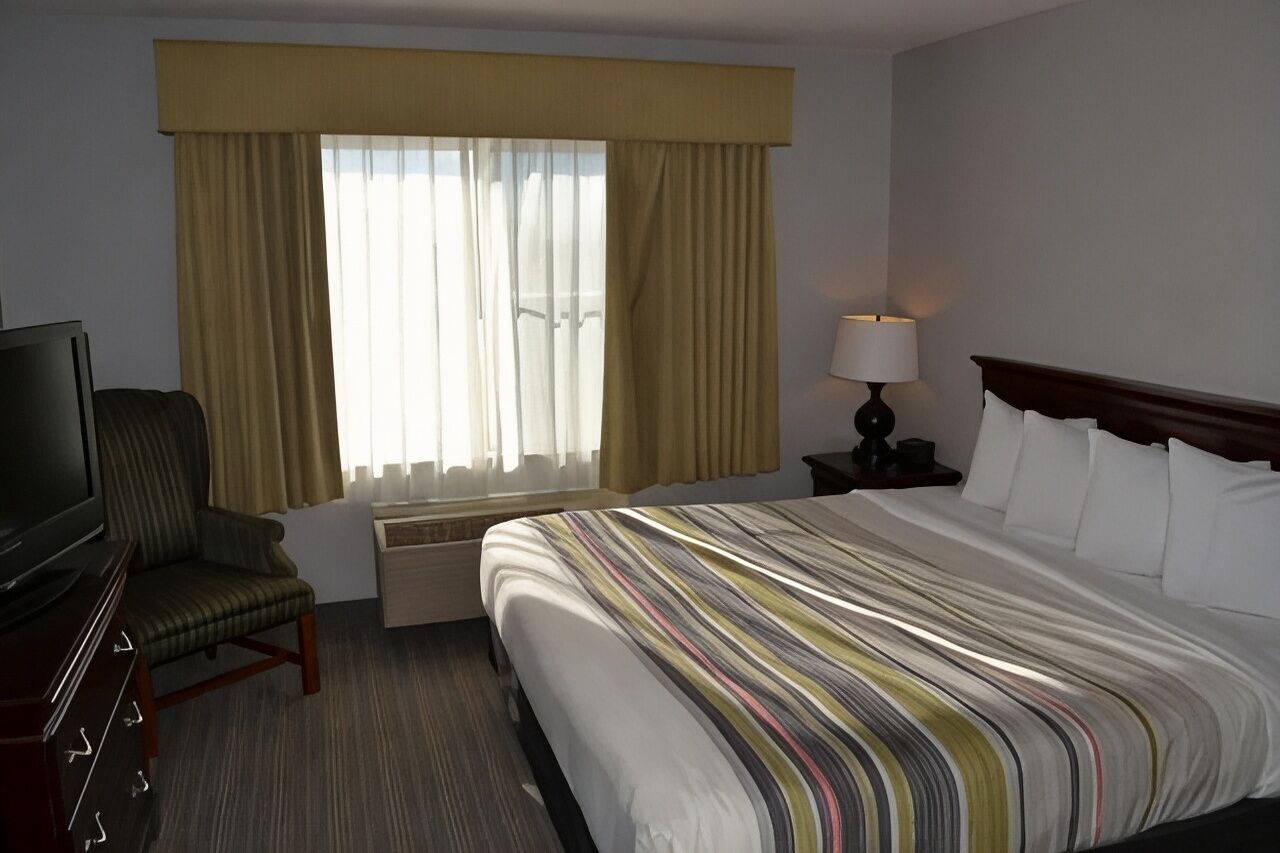 Down duvets, desk, blackout curtains, iron/ironing board