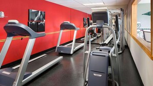 A gym with treadmills, elliptical machines, and weight equipment. - Country Inn & Suites by Radisson, Columbus West, OH (Columbus)