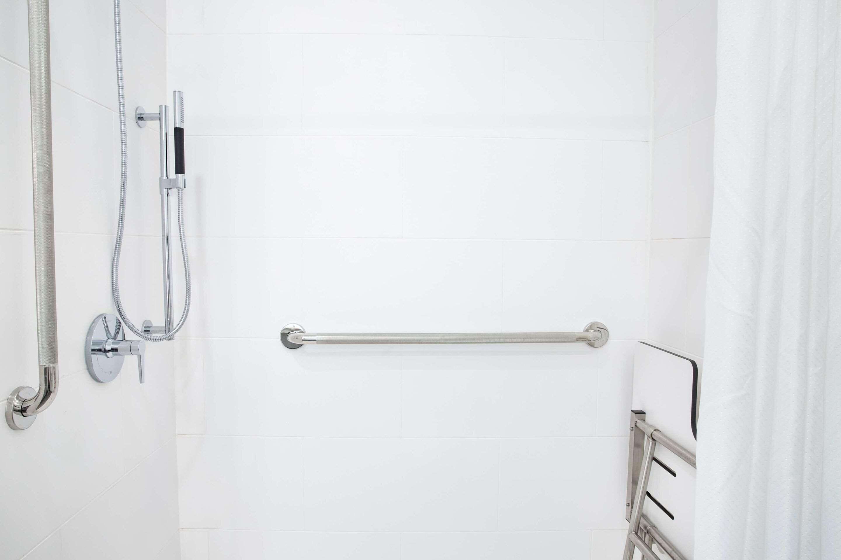 pillow-top beds, desk, laptop workspace, blackout curtains