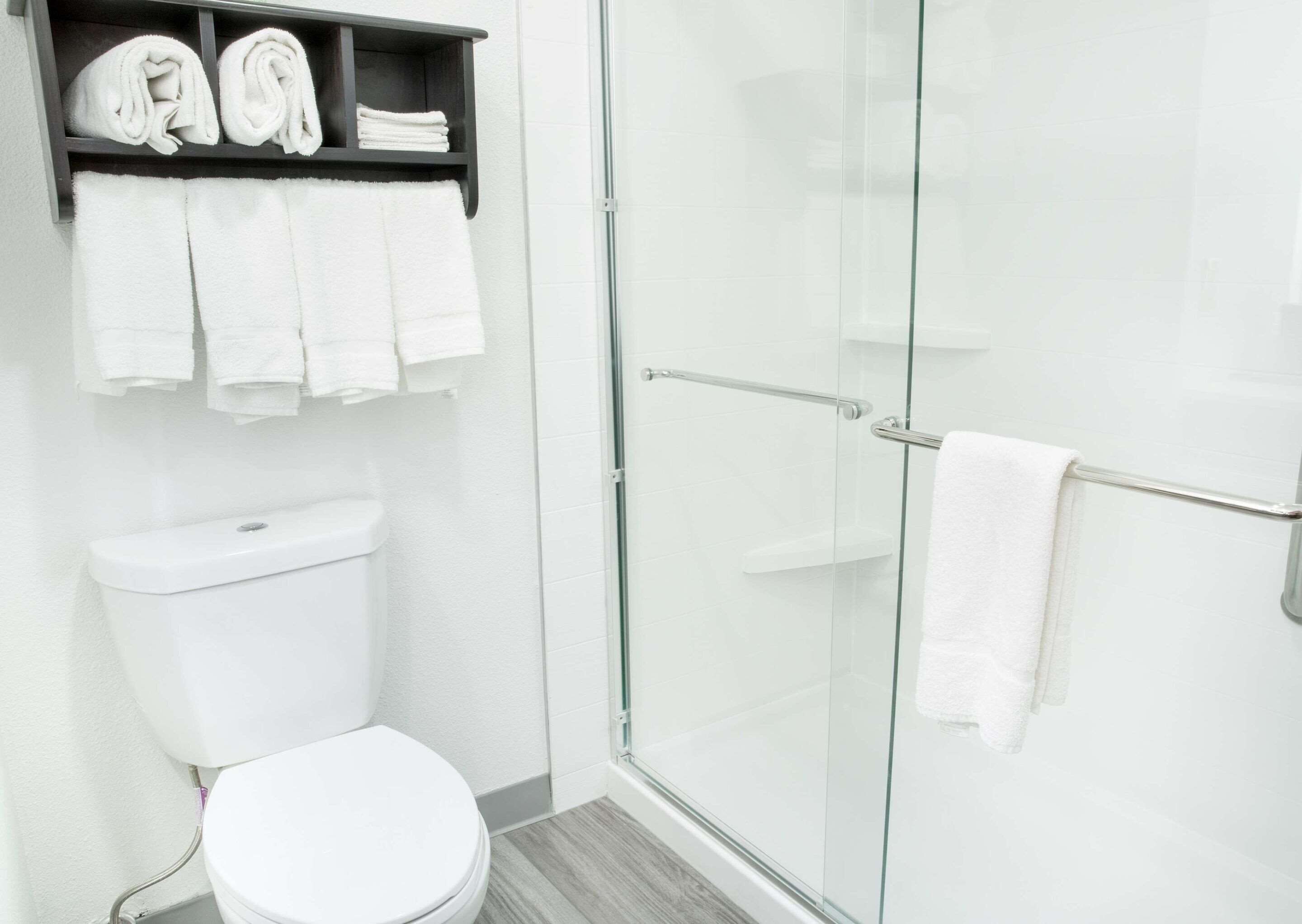 pillow-top beds, desk, laptop workspace, blackout curtains