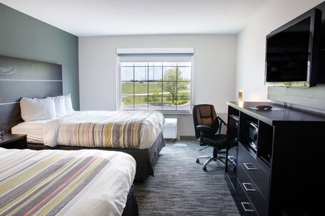 Pillow-top beds, desk, laptop workspace, blackout curtains
