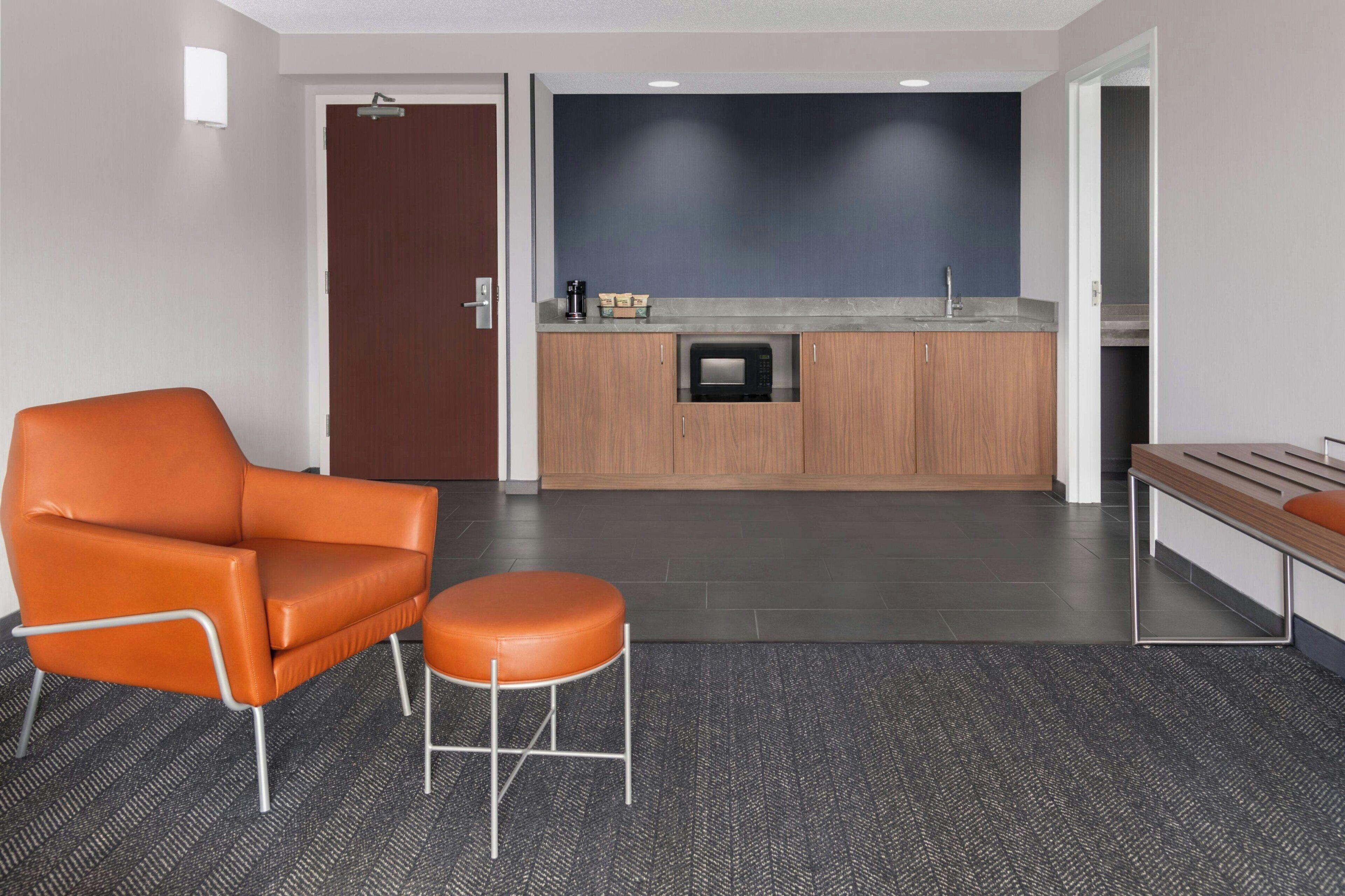 pillow-top beds, desk, blackout curtains, iron/ironing board