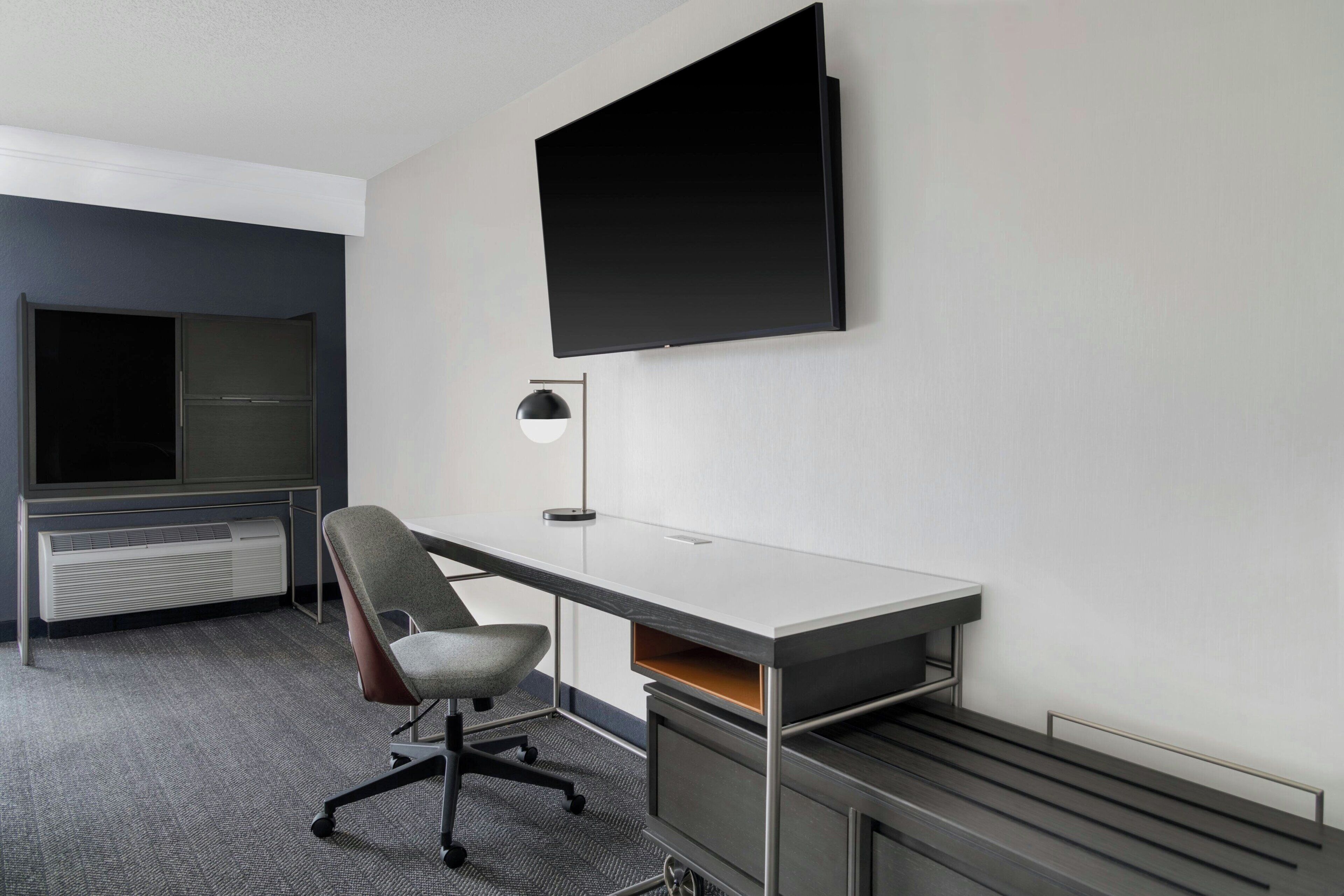 pillow-top beds, desk, blackout curtains, iron/ironing board