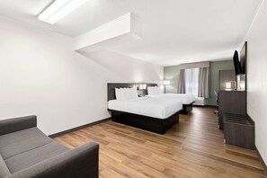 Suite, 2 grands lits, non-fumeur | 1 chambre, literie de qualité, lit avec matelas Select Comfort