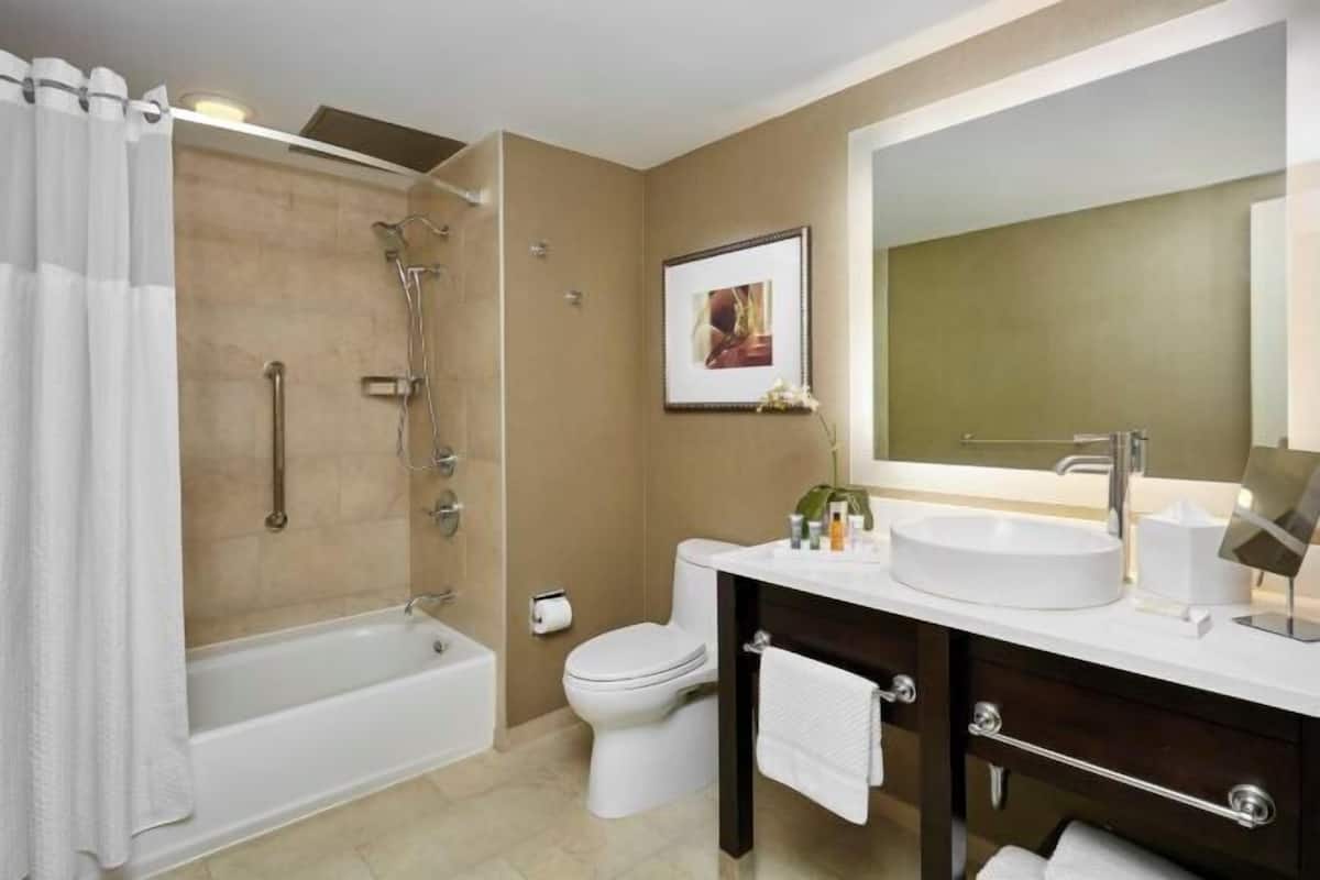 Rainfall showerhead, designer toiletries, hair dryer, bathrobes