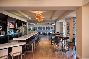 Enjoy a stylish dining experience with a variety of seating options and a fully stocked bar.
