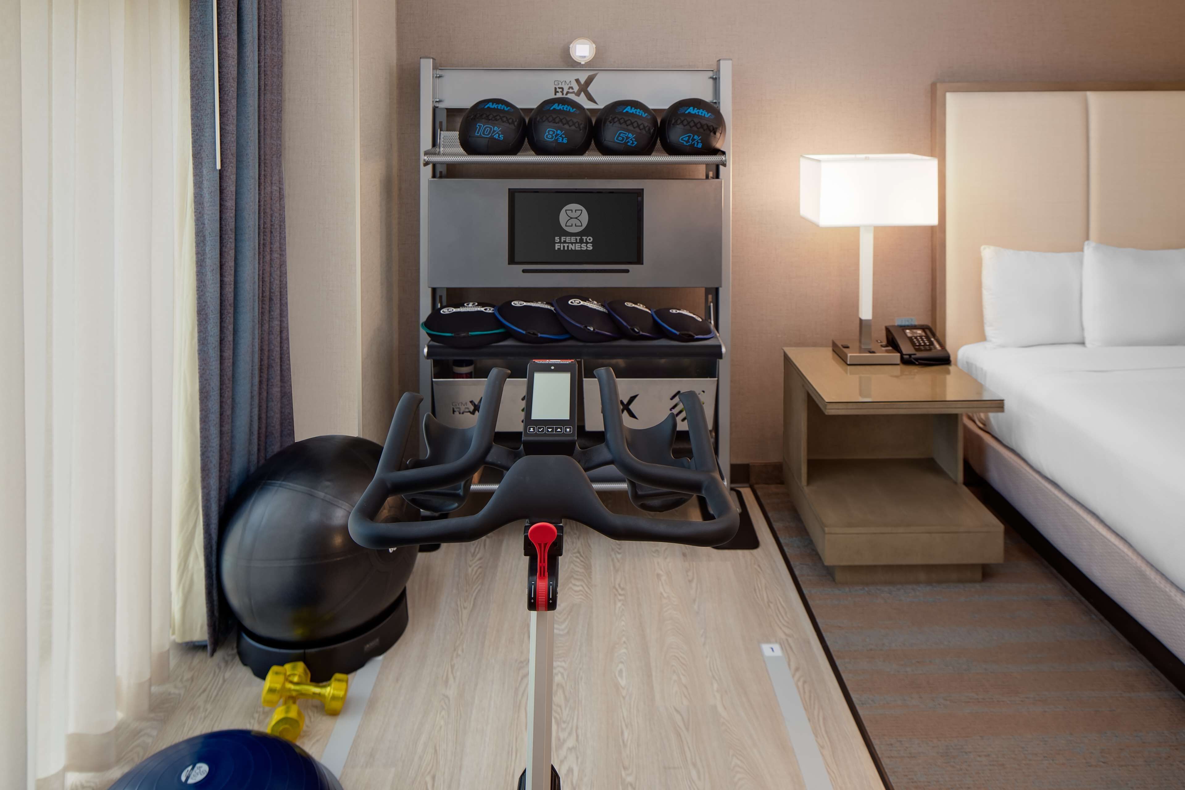 room, 1 king bed (fitness room) | in-room safe, desk, laptop workspace, blackout curtains