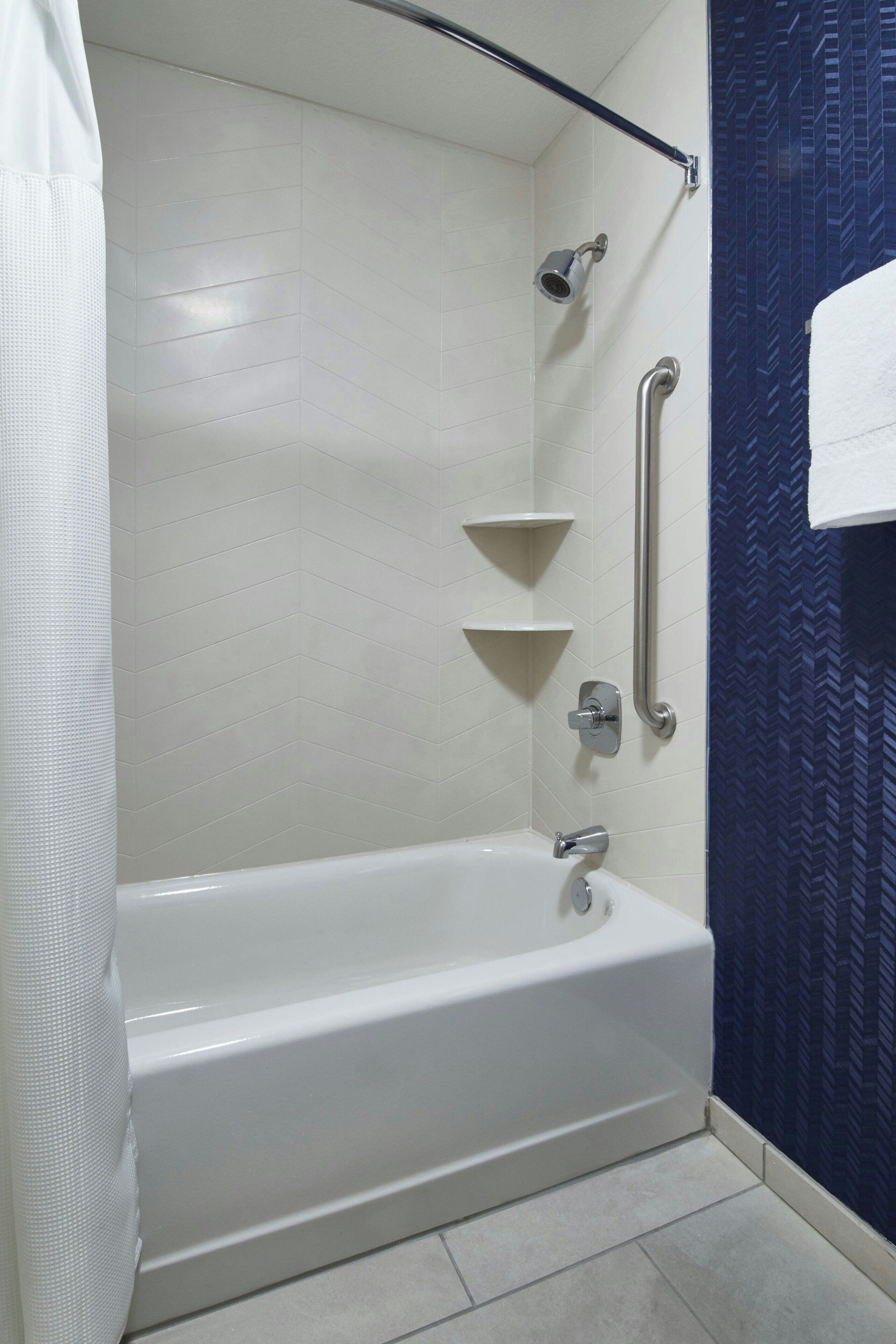 combined shower/bathtub, free toiletries, hair dryer, towels