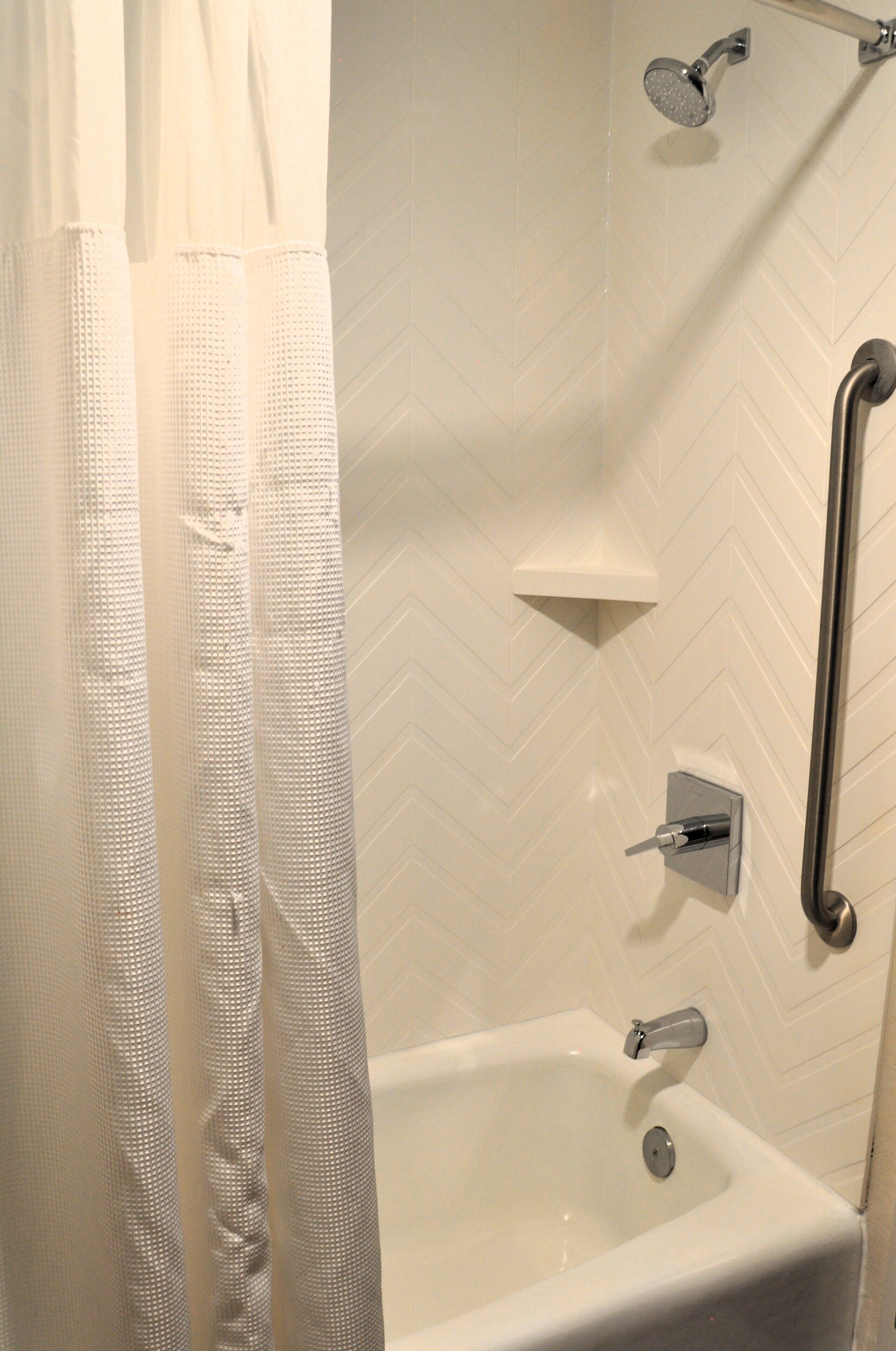 combined shower/bathtub, free toiletries, hair dryer, towels