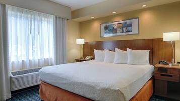 Desk, laptop workspace, blackout drapes, iron/ironing board